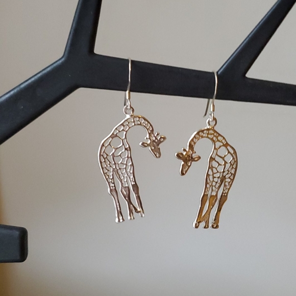 Sterling giraffe π¦ earrings.